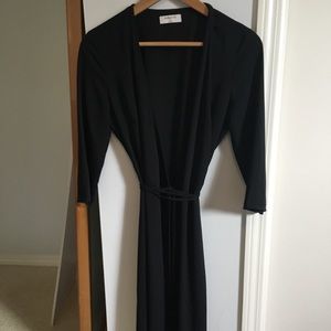 Black Aritzia Babaton wrap dress.